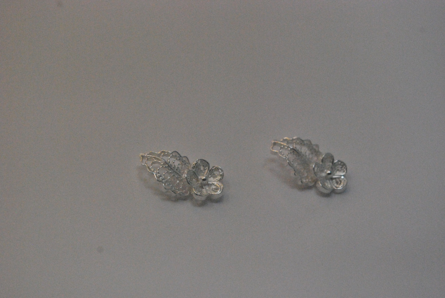 Tiny flower and leaf stud earrings